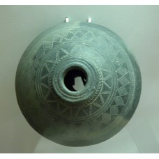 Clay vessel, sun symbol, triangle and diamond sun rays
